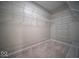 A walk-in closet with shelving for optimal storage and organization at 9455 Orchard Cove Dr, Indianapolis, IN 46239