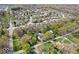 Aerial view of a tranquil neighborhood featuring lush greenery, well-maintained homes, and peaceful surroundings at 9944 Holaday Dr, Carmel, IN 46032