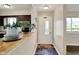 Entryway with decorative floor tiles and view to kitchen at 1043 E Castle Ave, Indianapolis, IN 46227