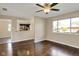 Bright living area featuring hardwood floors and an open layout to the kitchen at 1043 E Castle Ave, Indianapolis, IN 46227