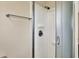 Shower with framed glass doors and silver fixtures at 1043 E Castle Ave, Indianapolis, IN 46227