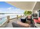 Relaxing balcony with comfortable seating and stunning lake views at 10919 Brigantine Dr, Indianapolis, IN 46256