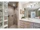 Updated bathroom features a stand up shower, decorative tiling, and a vanity at 10919 Brigantine Dr, Indianapolis, IN 46256