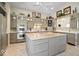 Spacious kitchen features stainless steel appliances and a large center island at 10919 Brigantine Dr, Indianapolis, IN 46256