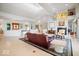 Spacious open-plan living room featuring a fireplace and high ceilings at 10919 Brigantine Dr, Indianapolis, IN 46256