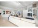 Bright open-plan living room with high ceilings and a modern fireplace at 10919 Brigantine Dr, Indianapolis, IN 46256