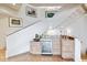 Lower level wet bar with light wood cabinetry, wine cooler, and attractive countertops at 10919 Brigantine Dr, Indianapolis, IN 46256
