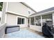 Back deck with an adjacent screened-in porch provides access to the home's interior at 10982 Gate Cir, Fishers, IN 46038