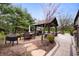 Extensive backyard boasts comfortable seating, outdoor cooking and beautiful landscaping at 1122 Mill Run Dr, Noblesville, IN 46062
