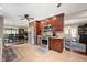 Open kitchen with stainless appliances and a view into the dining and living rooms at 1122 Mill Run Dr, Noblesville, IN 46062