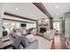 Bright and inviting living room with hardwood floors, a fireplace, and ample seating at 1122 Mill Run Dr, Noblesville, IN 46062