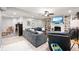 Finished basement with built-in shelving, sectional seating, and an electric fireplace at 1122 Mill Run Dr, Noblesville, IN 46062