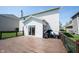 A well-maintained wooden deck featuring outdoor seating and a sliding door entrance to the home at 11327 Guy St, Fishers, IN 46038