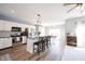 Kitchen features white cabinets, a kitchen island and eat in dining, perfect for Gathering gatherings at 11327 Guy St, Fishers, IN 46038