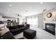 Open-concept living room flowing into kitchen and dining area, perfect for entertaining at 11327 Guy St, Fishers, IN 46038