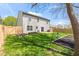 This spacious backyard has a nice lawn, garden beds, and is fully fenced at 11651 Beardsley Way, Fishers, IN 46038