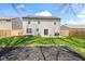 Spacious backyard with green lawn, patio, and fence, perfect for outdoor enjoyment at 11651 Beardsley Way, Fishers, IN 46038