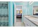 The bathroom features a double sink vanity with white cabinets and access to the bedroom at 11651 Beardsley Way, Fishers, IN 46038