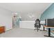 Upstairs landing area showing a bedroom with desk and chair at 11651 Beardsley Way, Fishers, IN 46038