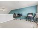 A bedroom with desks, computers, and neutral carpeting, perfect for a home office setup at 11651 Beardsley Way, Fishers, IN 46038