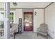 Inviting front door with a welcome sign and cozy seating area at 11651 Beardsley Way, Fishers, IN 46038