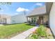Charming front porch with cozy seating, decorative plants, and a welcoming entrance at 11651 Beardsley Way, Fishers, IN 46038
