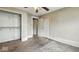 Cozy bedroom features natural light, ceiling fan, and carpet floors at 122 S 3Rd Ave, Beech Grove, IN 46107