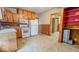 Functional kitchen with cabinetry, appliances, and linoleum flooring at 122 S 3Rd Ave, Beech Grove, IN 46107