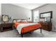 Cozy bedroom featuring a comfortable bed, matching nightstands, and a window for natural light at 1242 Petit Verdot Dr, Westfield, IN 46074