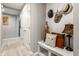 Inviting hallway with a bench, stylish decor, and a welcoming atmosphere, perfect for entry at 1242 Petit Verdot Dr, Westfield, IN 46074