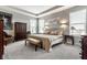 Spacious main bedroom with tray ceilings, carpeted floors, and large windows for ample natural light at 1242 Petit Verdot Dr, Westfield, IN 46074