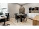 Bright office space featuring a glass table, modern shelving, and light wood flooring at 1242 Petit Verdot Dr, Westfield, IN 46074