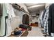 Organized walk-in closet offering ample storage space with shelves, racks, and room for luggage at 1242 Petit Verdot Dr, Westfield, IN 46074