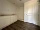 Bright bathroom featuring a double vanity with modern white cabinets, and a white shower stall at 1319 Fleming Dr, Greenfield, IN 46140