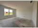 A light-filled bedroom with a large window and smooth, neutral walls offering a blank canvas for personalization at 1319 Fleming Dr, Greenfield, IN 46140