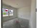 A room with a large window, smooth walls, natural light, and a blank canvas for personalization at 1319 Fleming Dr, Greenfield, IN 46140