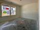 Unfinished bedroom with a large window, ready for personalization at 1319 Fleming Dr, Greenfield, IN 46140