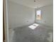 A room with natural light, a window, smooth walls, and a blank canvas for personalization at 1319 Fleming Dr, Greenfield, IN 46140