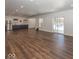 Spacious basement area with luxury vinyl flooring, built-in bar area, and walk-out access to the backyard pool at 13705 Beam Ridge Dr, McCordsville, IN 46055