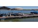 Well-equipped boat dock featuring multiple boat lifts and covered slips, offering convenient access to the water at 13705 Beam Ridge Dr, McCordsville, IN 46055