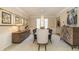 Elegant dining room with a modern chandelier, seating for eight, and sophisticated decor for memorable gatherings at 14491 Jeremy Dr, Carmel, IN 46033