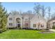 Stunning two-story home with light brick, mature landscaping, and inviting curb appeal in a desirable neighborhood at 14491 Jeremy Dr, Carmel, IN 46033