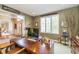 Stylish home office with a large desk, bright windows, and unique decor, perfect for productivity and comfort at 14491 Jeremy Dr, Carmel, IN 46033