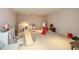 Spacious playroom with various toys and play structures, perfect for activities and entertainment at 14491 Jeremy Dr, Carmel, IN 46033
