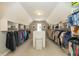 Extensive walk-in closet features custom shelves and ample storage space at 14491 Jeremy Dr, Carmel, IN 46033