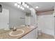 Bathroom featuring a double sink vanity, large mirror, tile floors, shower and tub at 158 Bloomfield Ln, Westfield, IN 46074