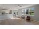 Spacious living area featuring hardwood floors, modern furnishings and views of the outdoors at 158 Bloomfield Ln, Westfield, IN 46074