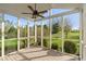 Screened porch with a ceiling fan and views of the green yard at 158 Bloomfield Ln, Westfield, IN 46074