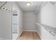 Spacious walk-in closet with shelving and an open doorway at 158 Bloomfield Ln, Westfield, IN 46074