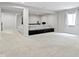 This finished basement features a modular sectional and tiered theater seating at 1747 Wellpark Dr, Westfield, IN 46074